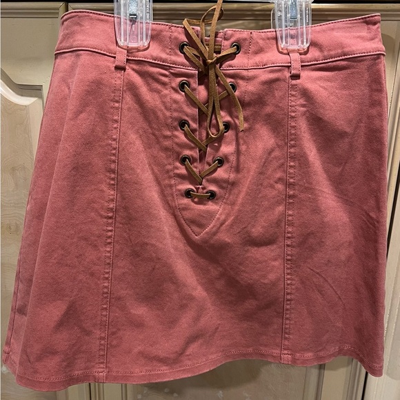 Never worn. Lace up skirt with zipper in back - Picture 1 of 2